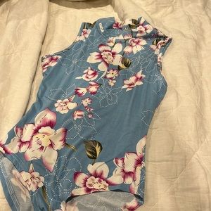 Blue flowered body suit